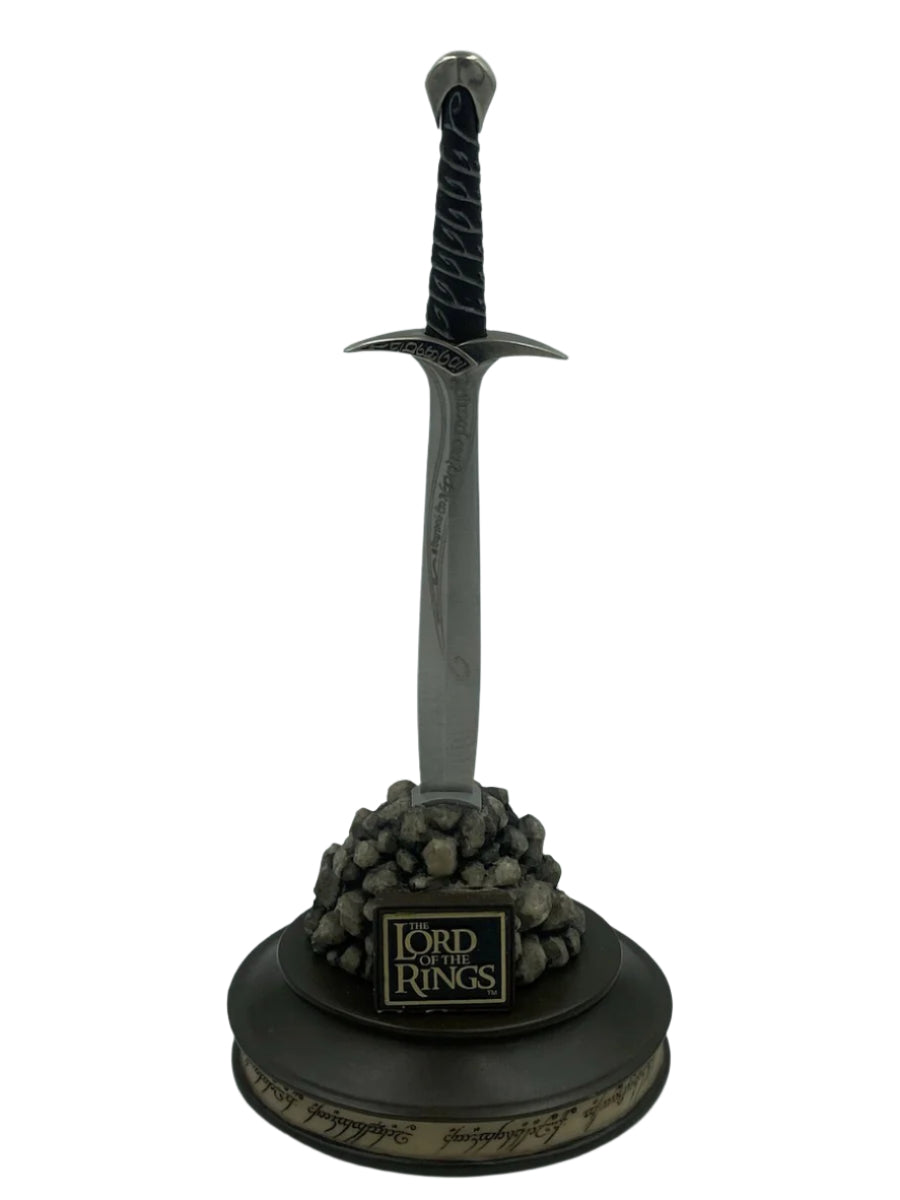 Sword model with decorative base on a white background