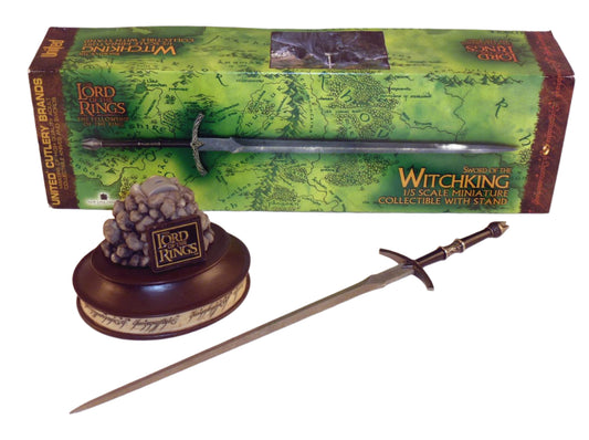 Sword of the Witchking collectible with packaging and stand on a white background