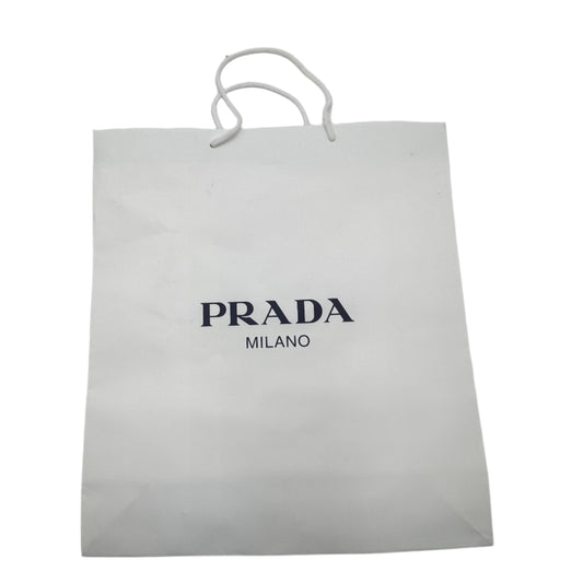 Prada Milano paper bag on a white background