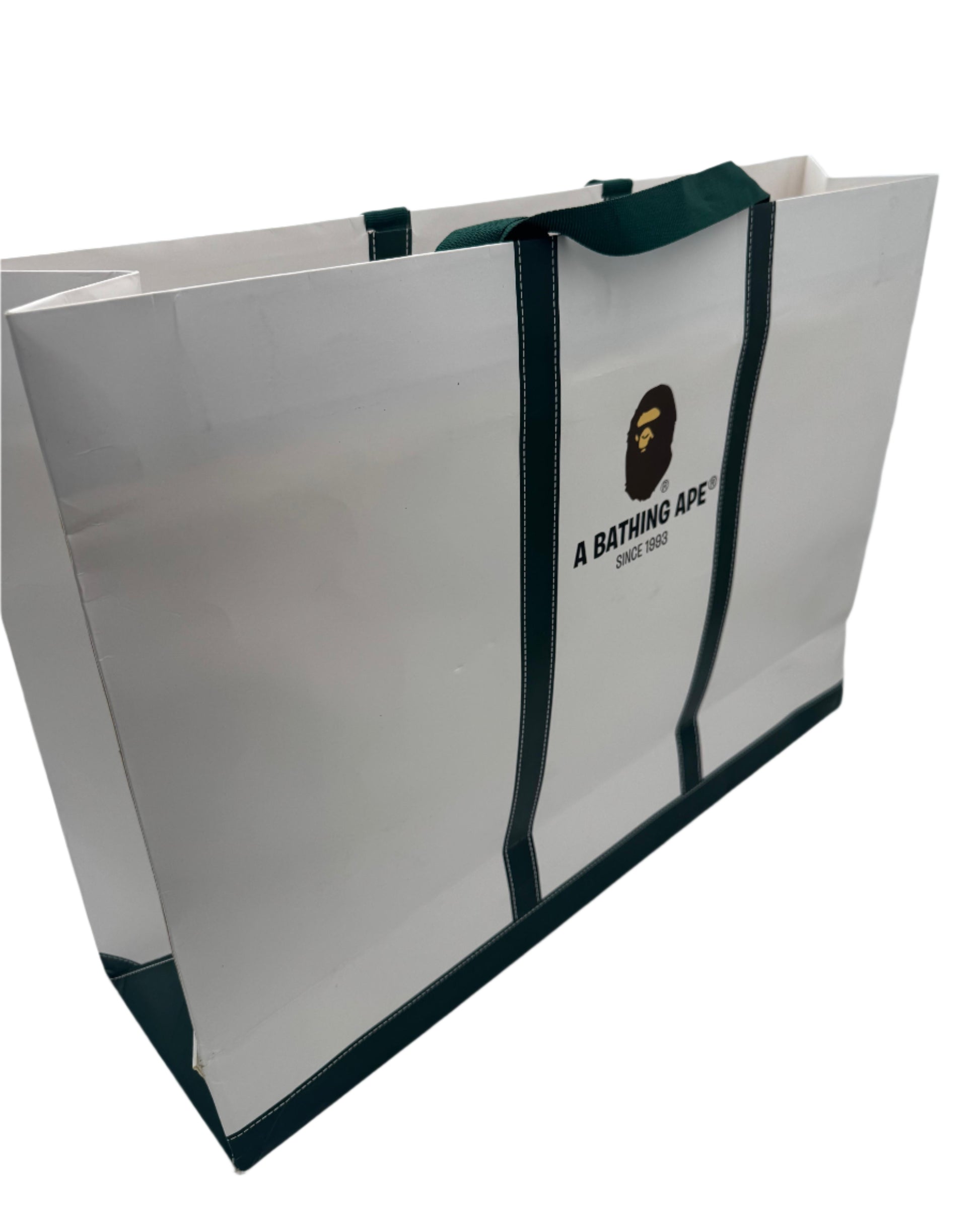White shopping bag with black accents and a logo on a white background