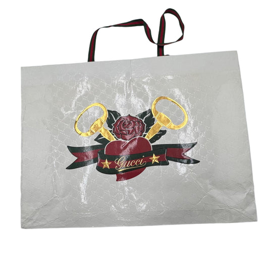 White tote bag with decorative design on a white background