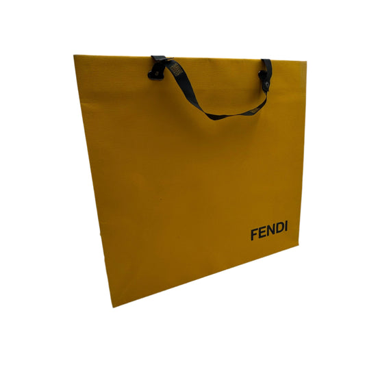 Yellow Fendi shopping bag on a white background